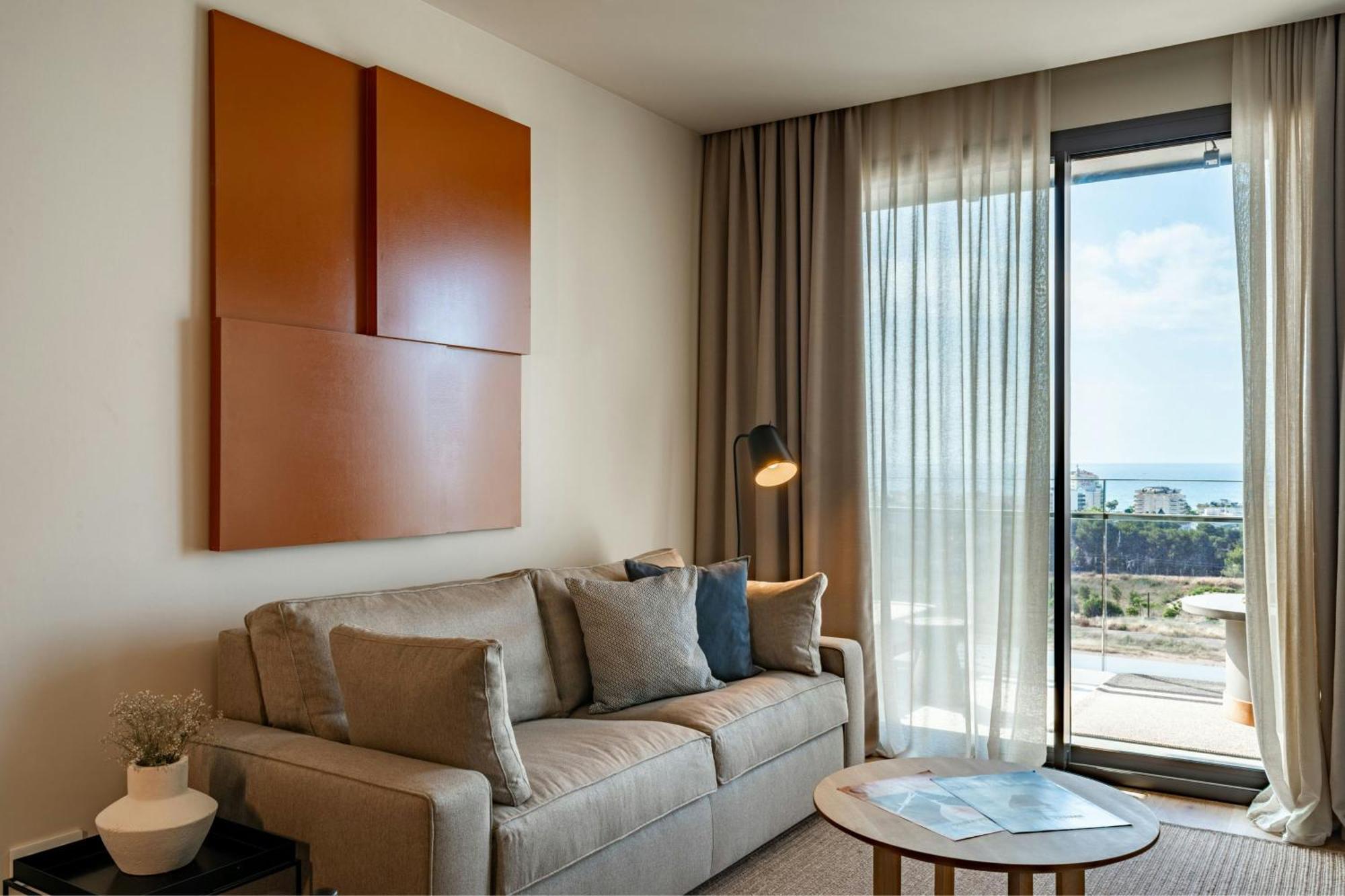 One-Bedroom Deluxe Queen Suite Partial Sea View